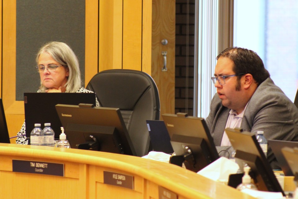 Prince George city councillors Trudy Klassen (left) and Tim Bennett (right) discuss their proposal for the development of a riverfront strategy at a meeting at city hall on Wednesday, Sept. 3, 2025.