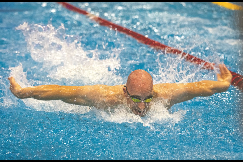 Prince George Pisces swimmer Brett Gandy powers his way through a 50-metres butterfly final during the BCSSA 2025 Provincial Championship Meet at the Aquatic Centre on Sunday, Aug. 17, 2025.