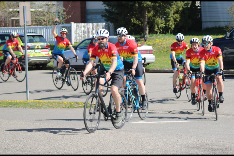 Riders from Cops for Cancer arrive at Quinson Elementary School Friday, May 2, 2025 in Prince George, BC.
