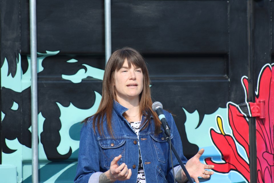 Artist Theresa Sapergia speaks to the crowd at the unveiling of her new mural at Canada Games Plaza on Thursday, July 10, 2025 in Prince George, BC.