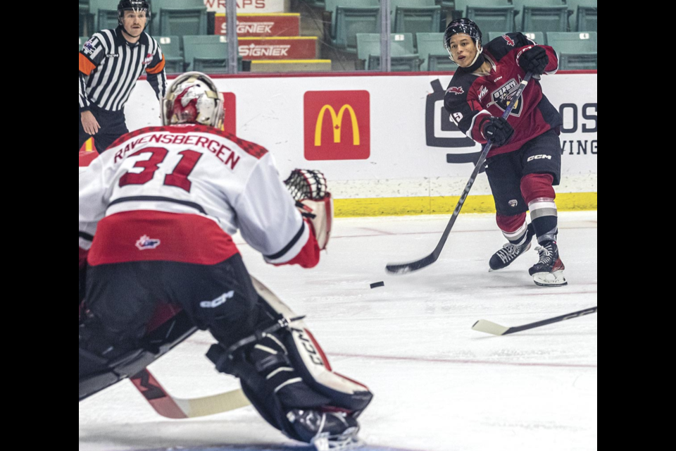 Vancouver Giants forward Cameron Schmidt takes a shot on Cougars netminder Josh Ravensbergen during a game Jan. 7, 2025 at CN Centre.