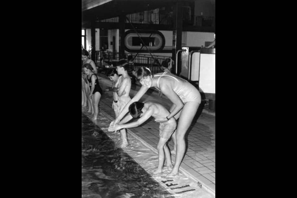 Debbie Schlick teaches swimming in the 1980s.
