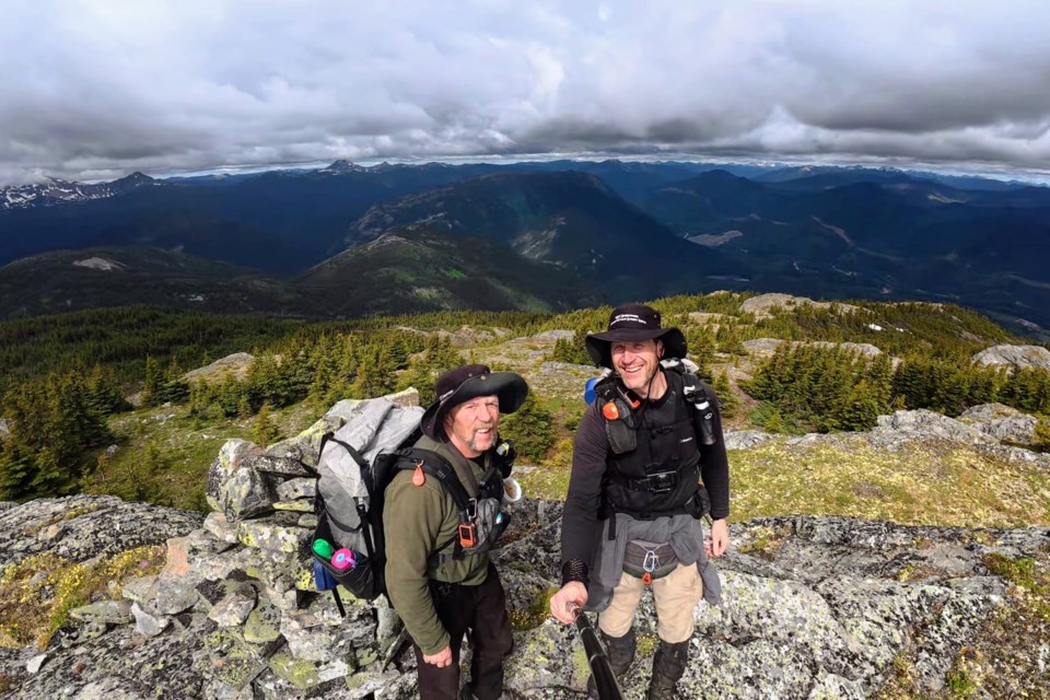 Mark Vejvoda and Gerald Wecih pose during their hike along the 'Donkey Trail.'