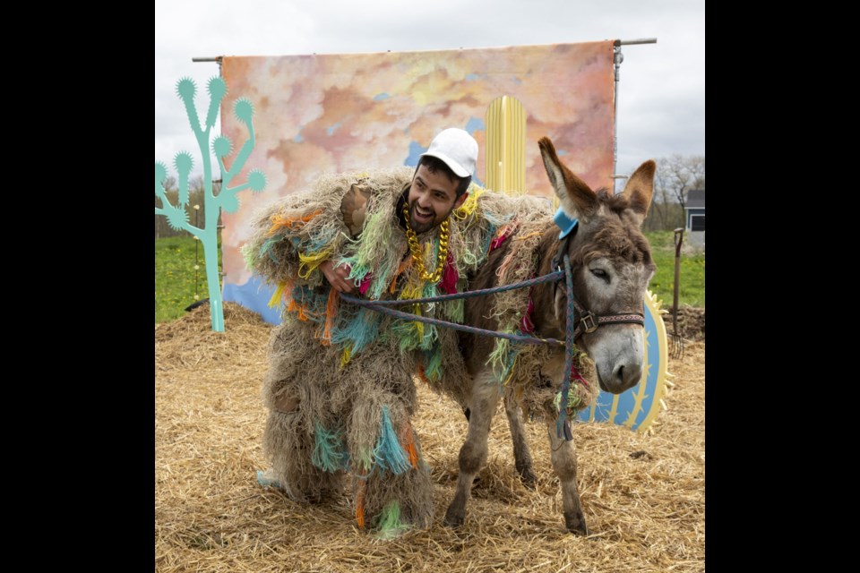 Joe Syme and his sister Grace Dove of Prince George won leg 7 of The Amazing Race Canada. To get the win Joe had to dress up and match with his donkey, then do a photo shoot where he had a lot of fun as seen here.