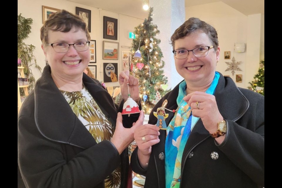 Twins Therese Martin and Rita Francis are big fans of Karen Heathman's work that can be found during Clayworks North's  Holiday Pottery Sale at Studio 2880's Pop Up Market at the Artisan Gift Shoppe on Dec. 16 from 10 a.m. to 4 p.m.