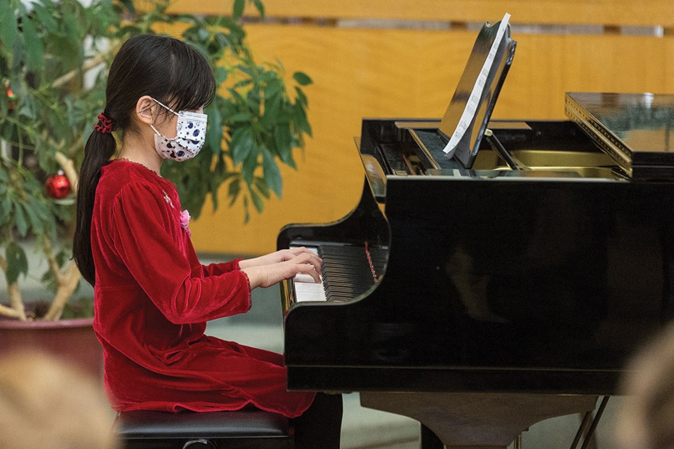 Citizen Photo by James Doyle. Brheanna Bianggos plays Jingle Bells on Saturday afternoon at Trinity United Church during Prince George Conservatory of Music's Winter Recital. 
