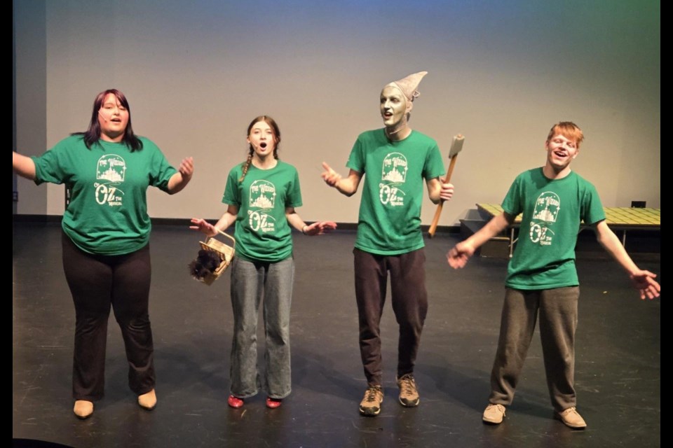 Seen here during rehearsal, second from the left, is Daysha Turner in ruby slippers, one of two actresses playing Dorothy during the Duchess Park Theatre Company production of The Wizard of Oz that goes April 8 to 12 at Duchess Park Secondary School.