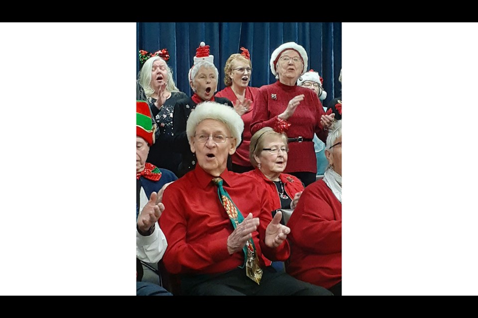 The Forever Young Chorus at the Elder Citizens Recreation Association will host a Christmas Sing Along on Dec. 11 at 2 p.m. Here you can see some of the enthusiastic group in rehearsal.