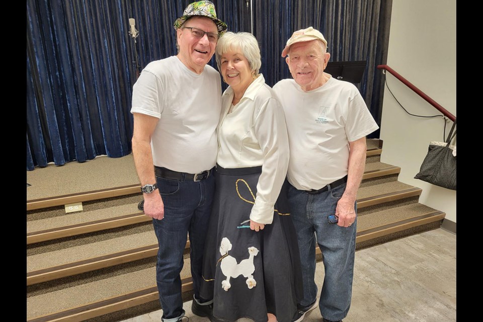 King George V student Ed Gladwin, teacher Roberta Johansen and Principal Wil Wiens reconnected after 60 years as members of the Forever Young Chorus will perform together May 5 and 7 at the Elder Citizens Rec Centre.