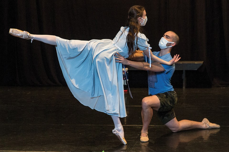 Matthew Cluff and Claire Westerlaken rehearse a scene from The Nutcracker on Sunday afternoon at Studio D in Judy Russell's Enchainement Dance Centre. Cluff will be playing The Nutcracker, and Westerlaken will be playing Clara in Judy Russell's upcoming presentation of The Nutcracker.