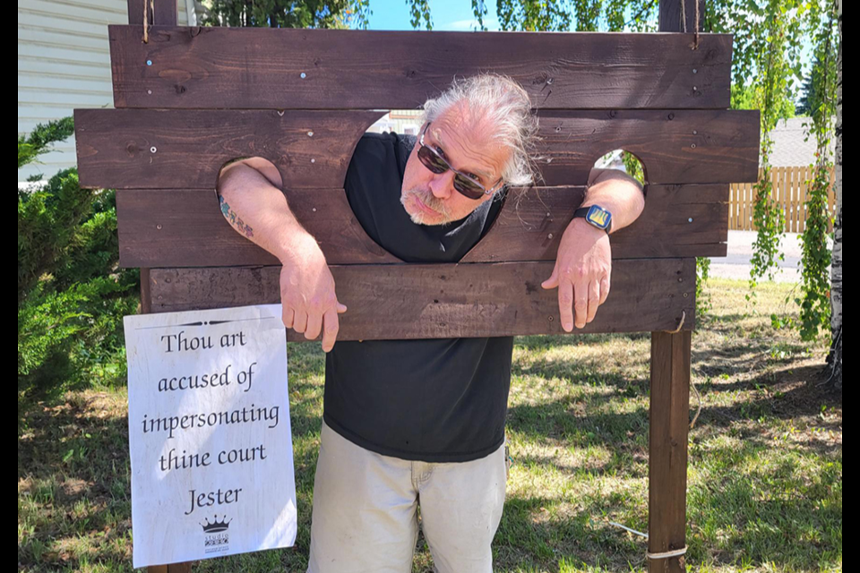 Michael Kast was sentenced to do some time in the stockade (pillory) at the Medieval Market at Studio 2880 Saturday.