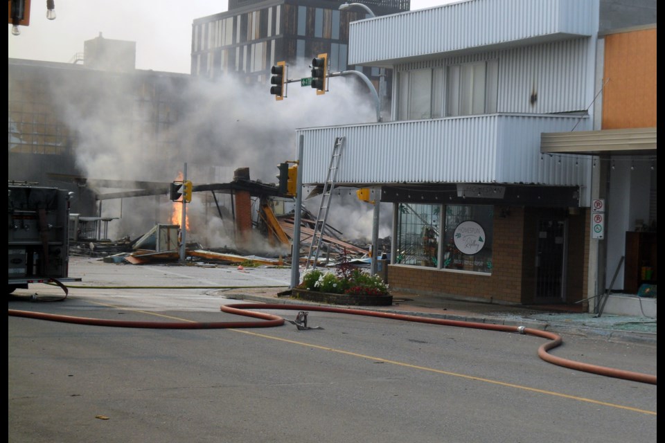 This is the view from John Zurowski's downtown studio which shows the shell of the building left after it exploded in a fireball Tuesday morning.