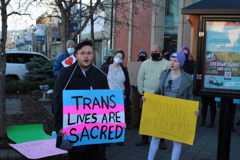 Jean Baptiste, who identifies as two-spirit, speaks at a trans rights rally downtown on Thursday.