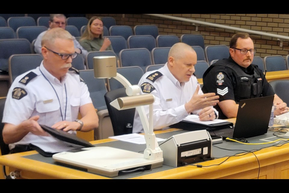 From left, RCMP then-Insp. Darin Rappel, RCMP Insp. Shaun Wright and BC Conservation officer Sgt. Eamon McArthur attend a past meeting of Prince George city council to discuss 2023 crime statistics. Rappel will return to give a presentation on 2024 statistics at the Jan. 15 meeting.