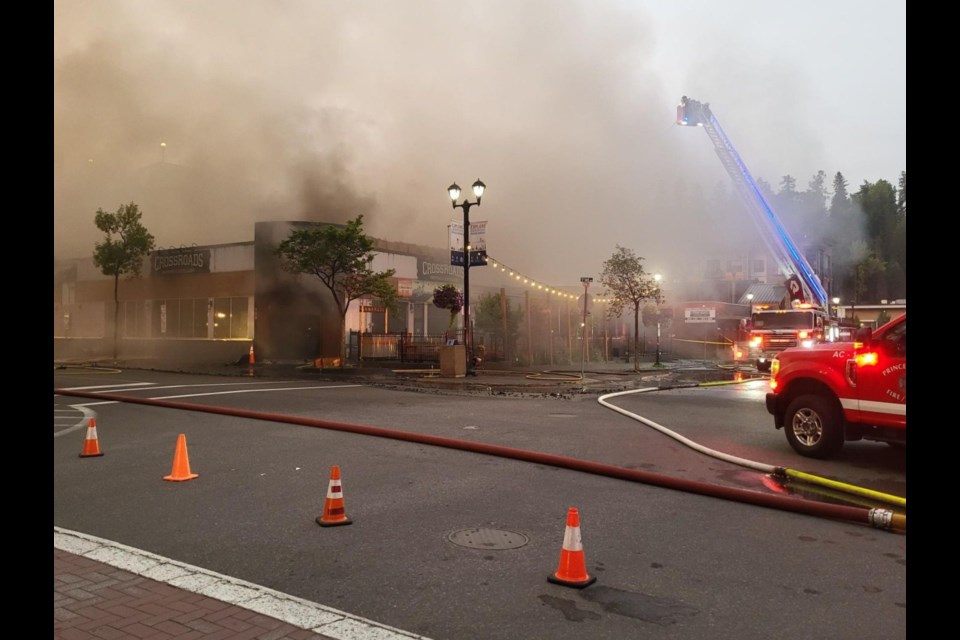 CrossRoads Brewing & Distillery burns at the corner of Fifth & George Friday, Sept. 5, 2025. Fire crews were still dousing the building at about 6:20 a.m.