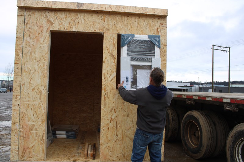 Doors and Windows have been donated by Central Door and Window and will be installed once the houses are placed. 