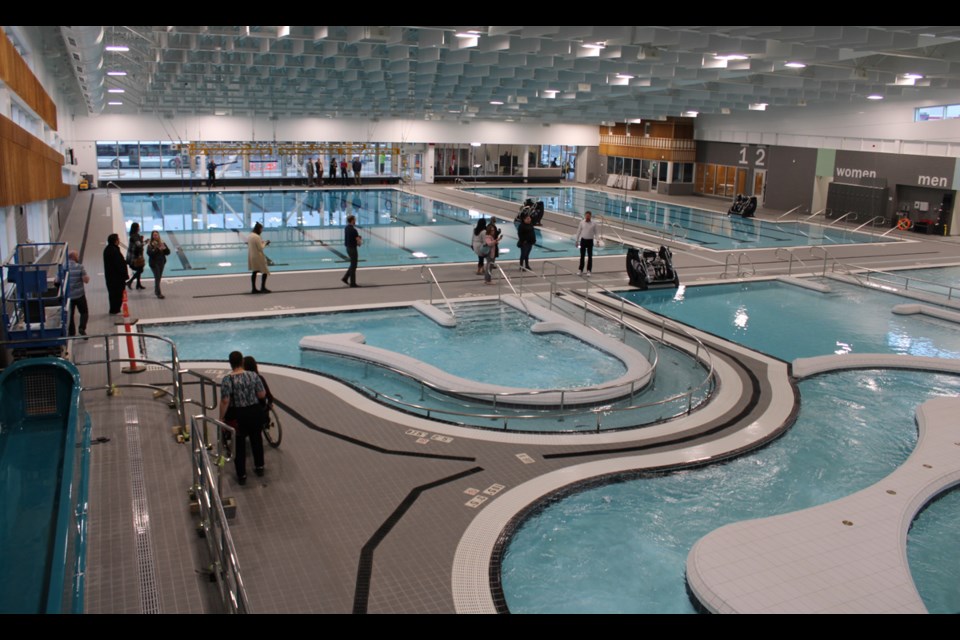 Delegates toured the main pool deck of the Canfor Leisure Pool on Oct. 19. The pool opens fully to the public on Nov. 14.