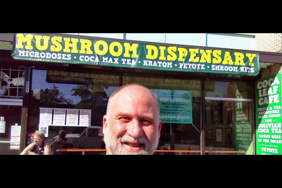 Vancouver retailer Dana Larsen stands next to his downtown store that sells magic mushrooms and other hallucinogenic drugs.