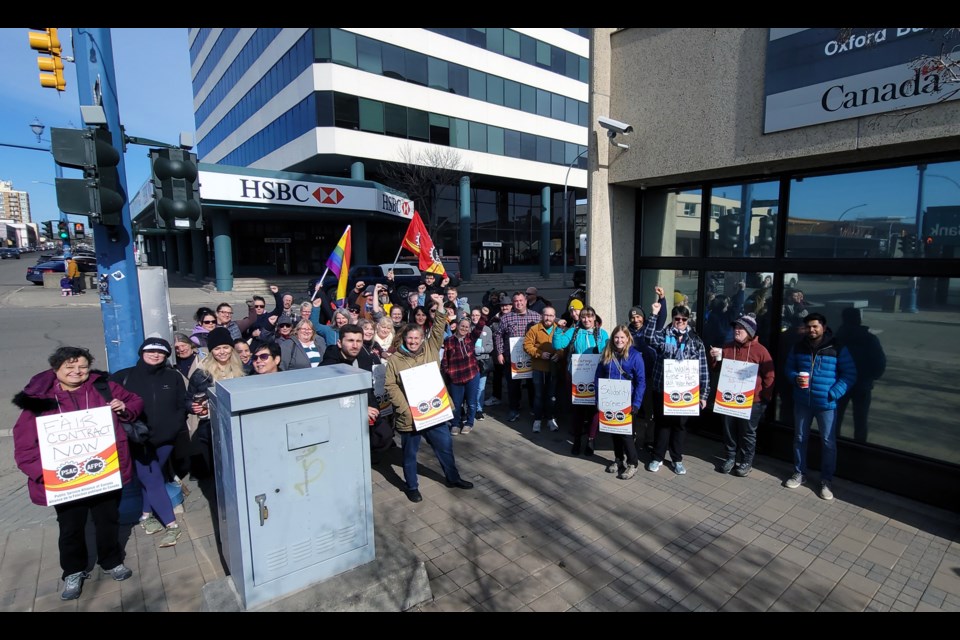 Prince George workers from the Public Service Alliance of Canada set up a picket line around the federal Oxford Building on Victoria Street after they walked off their jobs Wednesday.
