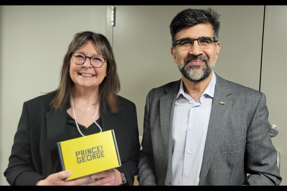 Future Fuels Forum panelists Tessa Gill, left, and Hossein Kazemian discussed opportunities for research and development between Arbios Biotech and UNBC.
