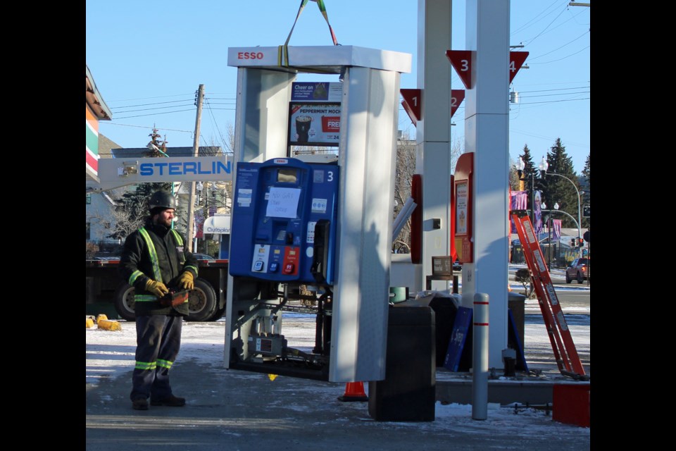 The gas pumps were being dismantled Thursday at the now closed 7-Eleven on 20th Avenue.