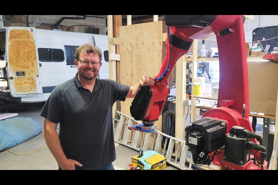 Simon Angus of Open Water Manufacturing and Design is taking advantage of robotics technology to produce virtually indestructible solar panels at his shop in downtown Prince George.