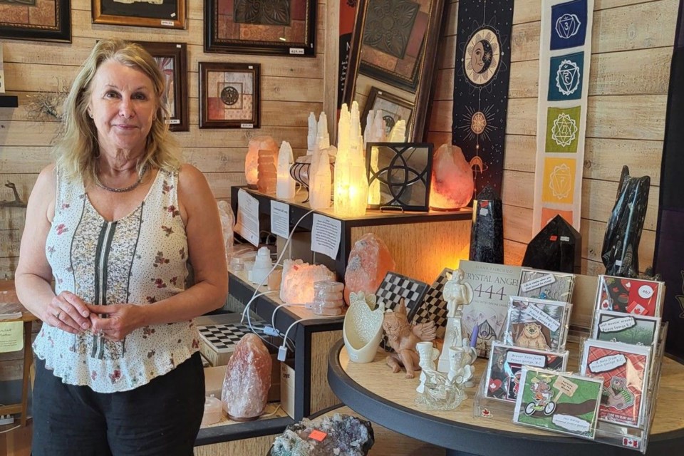 Sue Bloomingdale of Sisters Rock'n Gems located on Specialty Avenue was threatened by a machete-wielding man as she came upon him trying to break into another store recently.