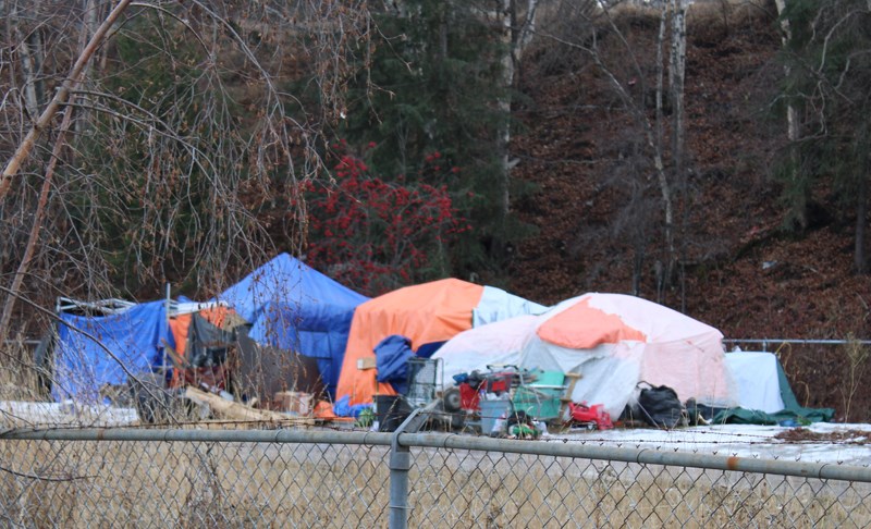 A handful of tents remain at the Moccasin Flats homeless camp as of Monday.