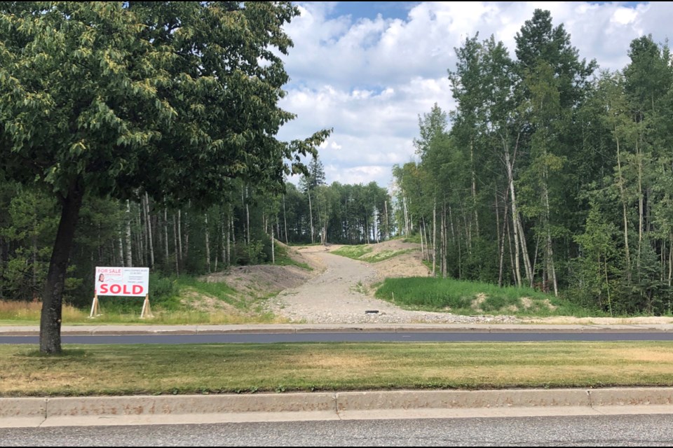 The site of a proposed new subdivision at 4443 and 4505 Ospika Blvd. is seen from Ospika Boulevard in a Citizen file photo.
