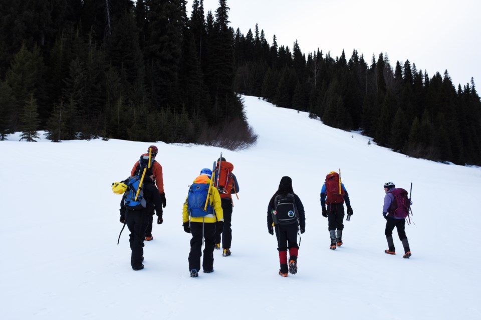 Volunteers from Prince George Search and Rescue conduct a ground operation in a mountainous area. SAR groups in BC face a Friday deadline to register with the province's Emergency Managment and Climate Readiness agency.