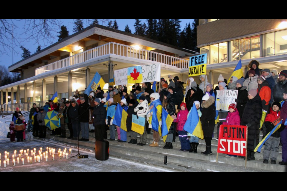 A crowd of about 200 gathered on the steps of Prince George city hall for a vigil to remember the victims of the war in Ukraine since the Russian invasion began a year ago. 