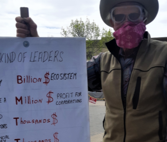 Summit Lake resident Floyd Crowley carried a sign at Saturday's protest at the Prince George Courthouse to show his displeasure about the provincial government's old-growth forest management practices.