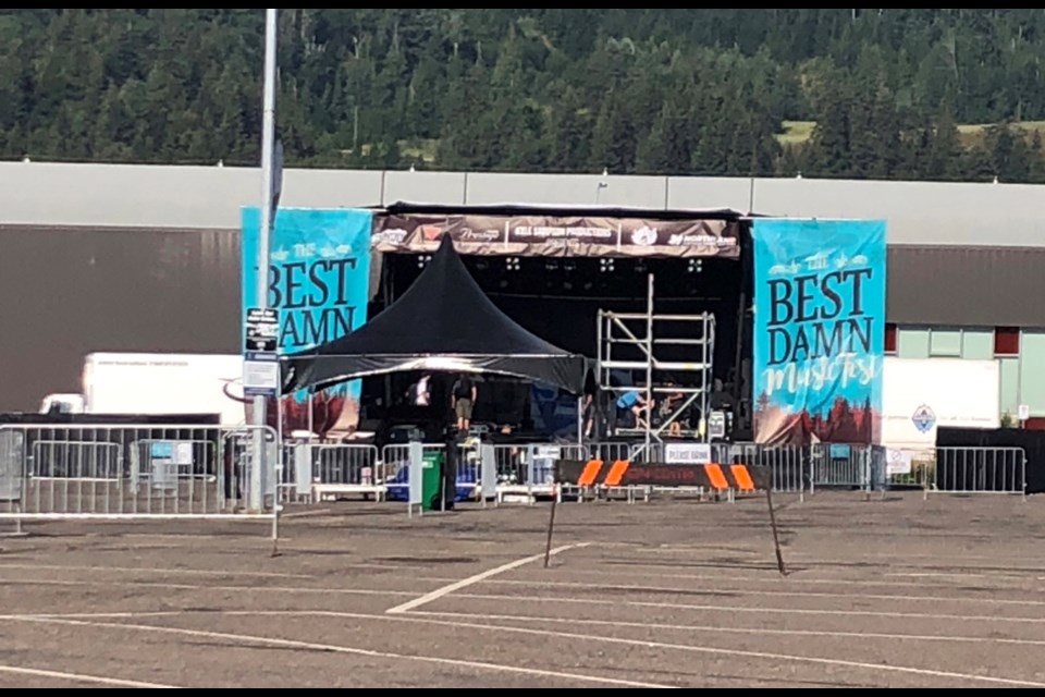 Crews set up the stage for the Best Damn Music Festival on Friday morning at the Prince George Exhibition Grounds.