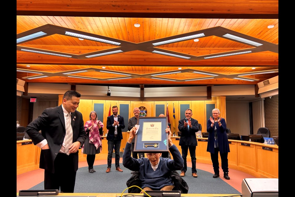 Trelle Morrow receives the Freedom of the City from Mayor Simon Yu. 