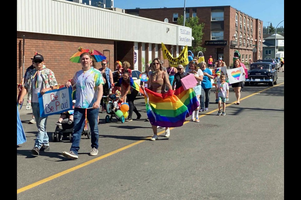 Parade participants marched through downtown Saturday.