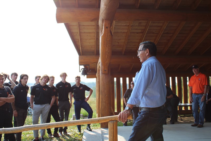During a visit to the site of the former Lejac Residential School near Fraser Lake, Lheidli T'enneh Elder Clifford Quaw speaks to Prince George Cougars about his experiences attending the school from 1953-63. 
