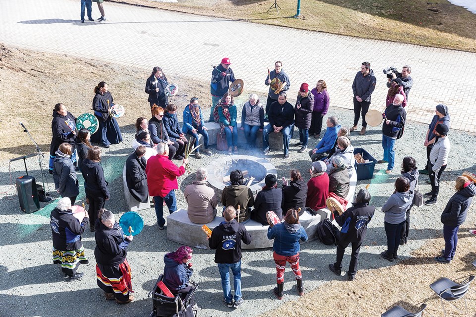 Citizen Photo by James Doyle. Drummers play their drums around the Fire Circle on Wednesday afternoon UNBC's Agora Courtyard for the Four Connections Spring Equinox and Ceremonial Fire Circle.