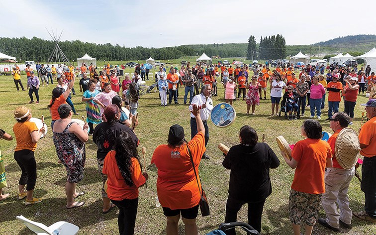 Citizen Photo by James Doyle/Local Journalism Initiative. Drummers play the closing song on Sunday afternoon during the final day of the Wiping of the Tears Healing Ceremony that was held on the site of the former Lejac Residential School.