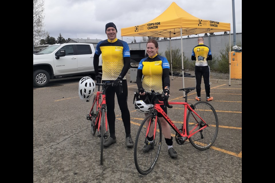 Robert Warren, 29 and Stacey Osiowy, 45, are the Prince George riders for the Cops for Cancer Tour de North where 22 people will raise money for the Canadian Cancer Society's children's cancer research and support programs to help those children in need.