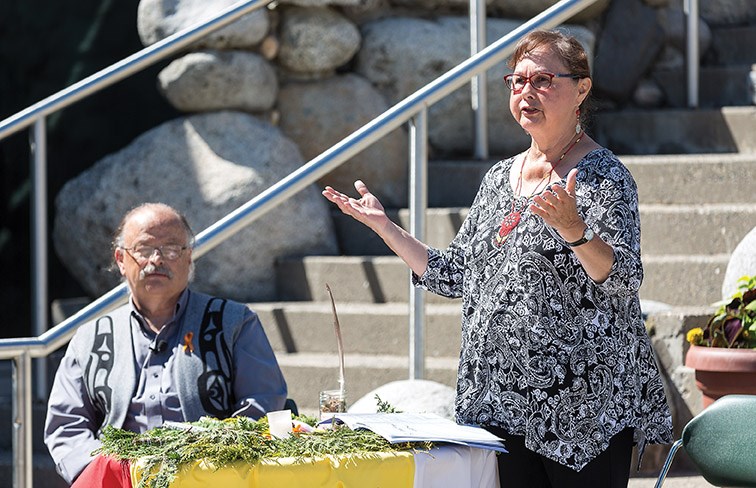 Citizen Photo by James Doyle/Local Journalism Initiative. Lheidli T'enneh Elder Darlene McIntosh gives an opening prayer at UNBC's Agora Courtyard on Thursday afternoon during the Four Connections Summer Solstice Celebration.