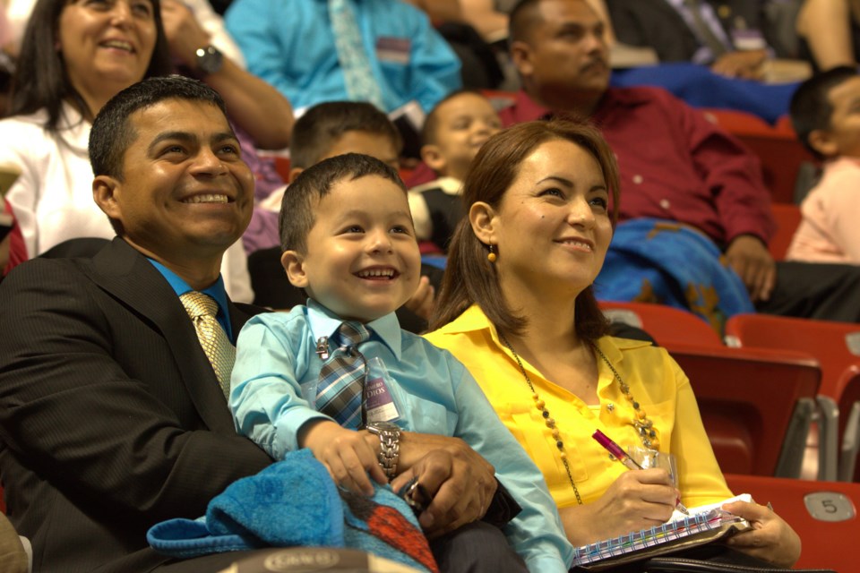 Family attends a Jehovah's Witnesses convention together.