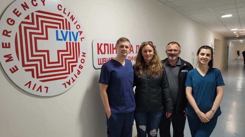 Cameron and Terresa Stolz pose with interns from the hospital in Lviv, Ukraine. 