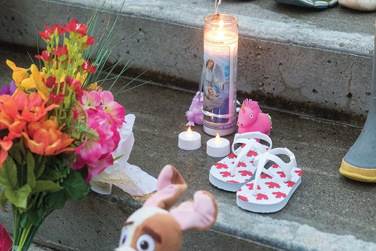 Citizen Photo by James Doyle/Local Journalism Initiative. A memorial has been set up on the step of city hall in remembrance of the 215 children whose remains were found in a mass grave on the site of a former residential school in Kamloops.