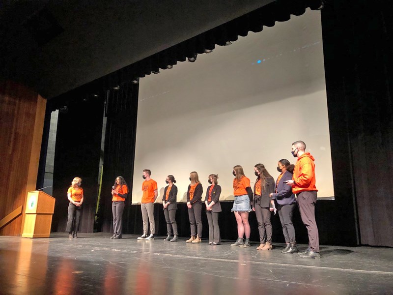 DSAC students gather on stage following the film premiere. 