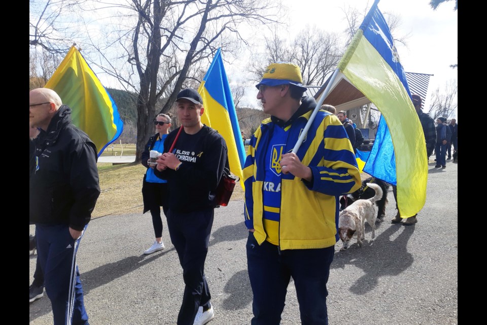 UNBC Timberwolves guard Vova Pluzhnikov (wearing black cap) participates in Saturday's P.G. Solidarity Walk for Ukraine.