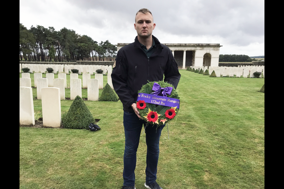 Eric Depenau, officer in command of the Rocky Mountain Rangers Bravo Company Army Reserve light infantry unit in Prince George, holds a wreath he placed at the grave of a Rocky Mountain Ranger soldier killed during the First World War, who lies in the Canadian National Vimy Memorial Park in France.