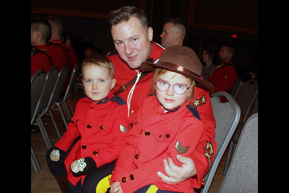 RCMP Sgt. Devin Huff and his kids, three-year-old Jordan and five-year-old Alivia, were dressed in red serge for Remembrance Day ceremonies  Saturday at the Prince George Conference and Civic Centre