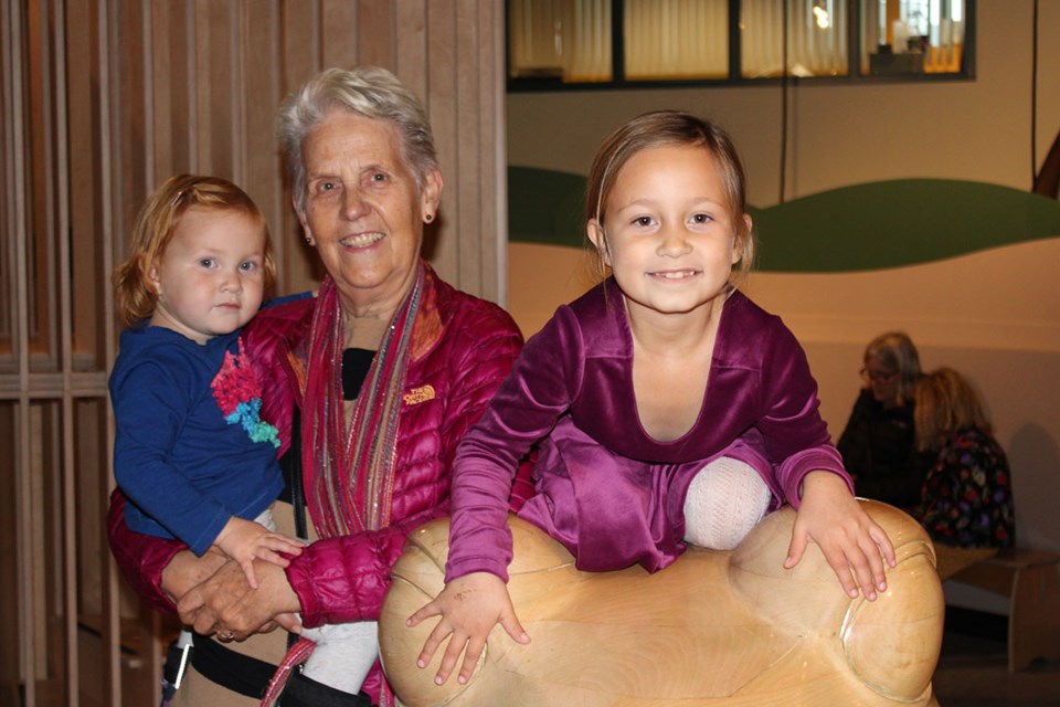 Arlene Dyer, is seen here with grandchildren Madeline, 7 and Alice, 2, at The Exploration Place grand re-opening Saturday.