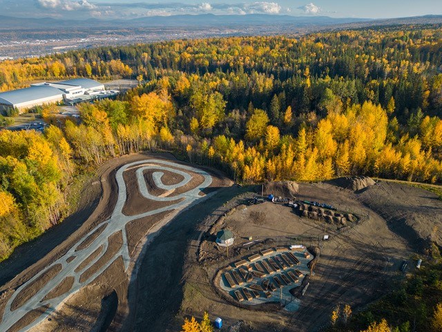 This drone shot shows the Phase 2 expansion of the David Douglas Society Botanical Garden on the southwest edge of the UNBC campus. The Rotary community garden (bottom right) sits on a plateau overlooking the display garden and pathways.