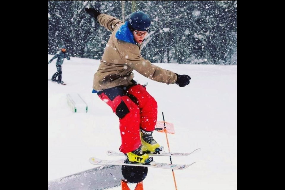 Loic St. Denis tests his rail-riding abilities at the Hart Ski Hill terrain park.